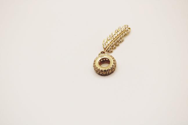 Long gold leaf charm 14k